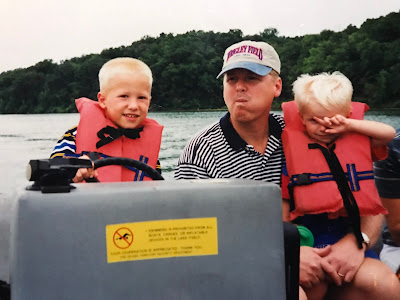 Children playing soccer and lemonade stand in green grass