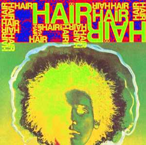 Man getting a haircut in a bright salon