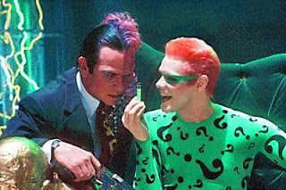 Andrew clutching his Batman toy outside the Deerfield barber shop