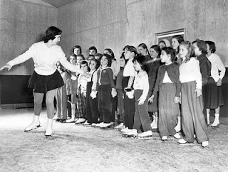 Children skating at Michael Kirby rink in winter