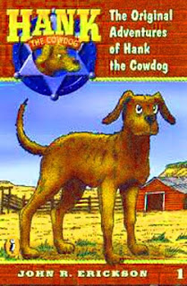 Two boys resting under rusty gas pumps near Emerald Swamp